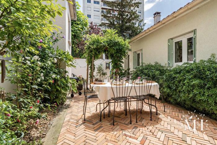 Maison avec deux terrasses achetée à Asnières
